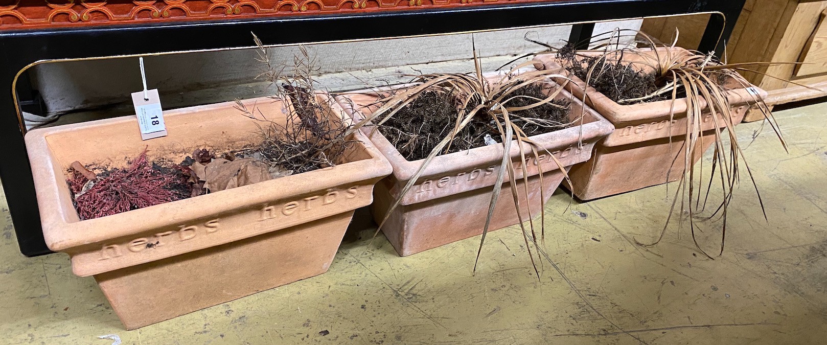 A set of three rectangular terracotta herb planters, width 44cm, depth 25cm, height 24cm